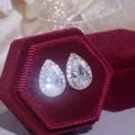 kf-Sa37f1f72c72c4deeac2d7e1a797dd05au-Classic-Water-Drop-Shape-Studs-Ear-Shine-AAA-White-Cubic-Zirconia-Stud-Earrings-for-Women-Wedding